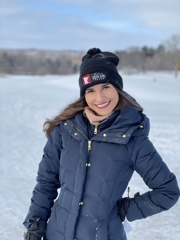 Valeria wearing Sota Girl Beanie Pom Pom Black Hat