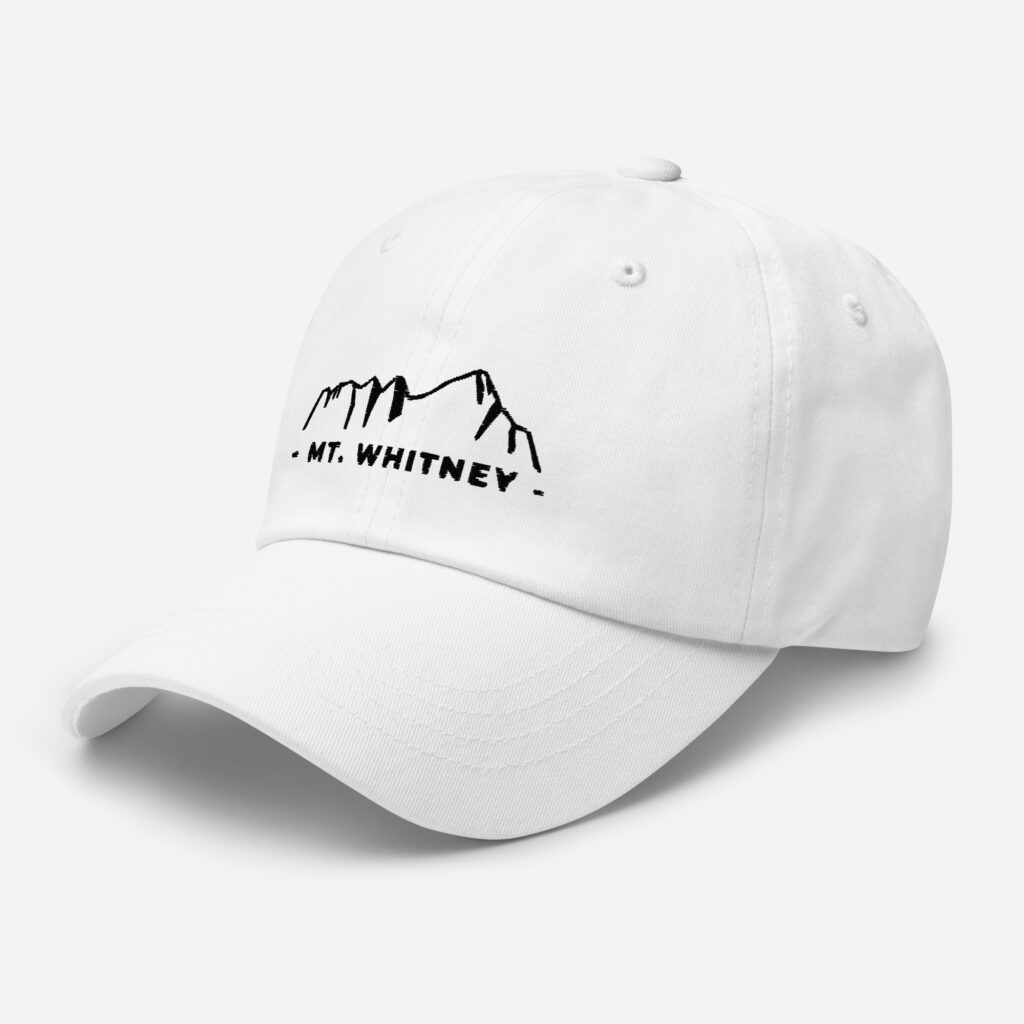 Mt. Whitney White Hat with Black Mountains in silhouete
