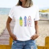 surfboard images FINAL with straightened middle board on woman at the beach no surf girl words copy