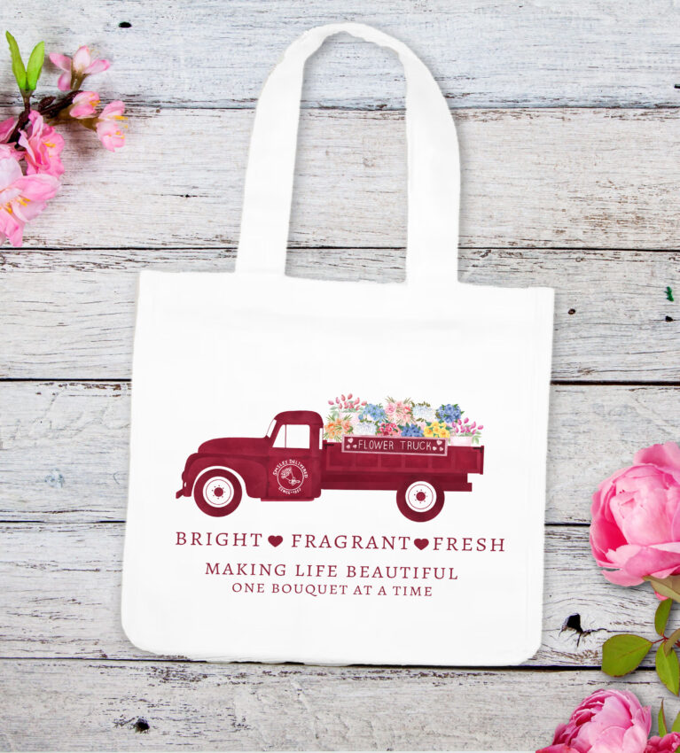 Flower Truck on light wood background with pink flowers